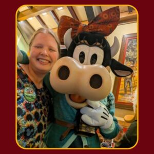 Picture of Miss B with Clarabelle at Disneland